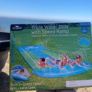 Triple waterslide with speed ramp